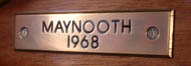 This plaque is mounted on a plinth in the main cabin
